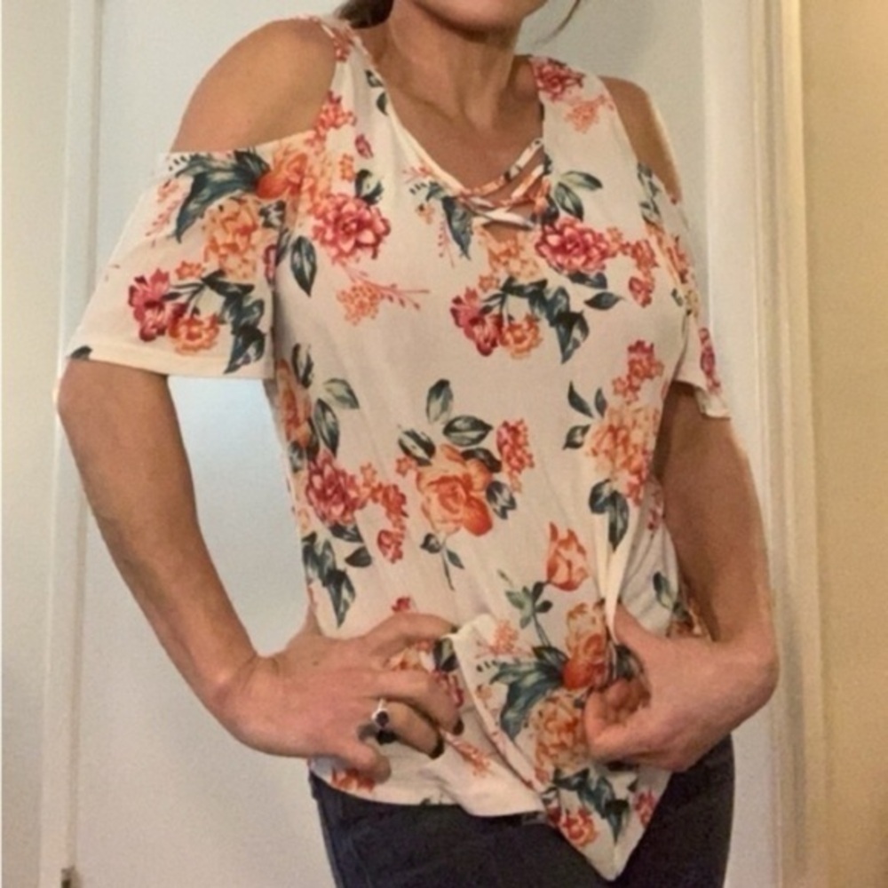 Cold shoulder floral top brand is MINE size medium fabric is stretchy